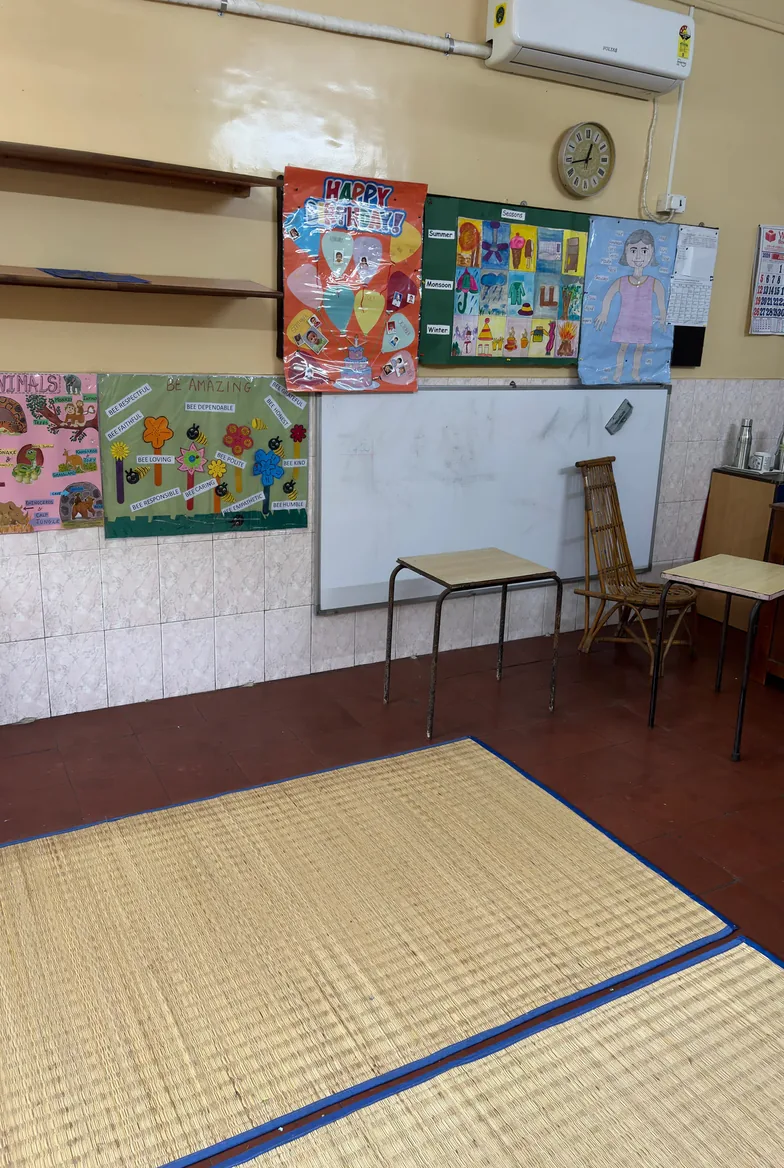 A New Activity School classroom with artwork on the walls